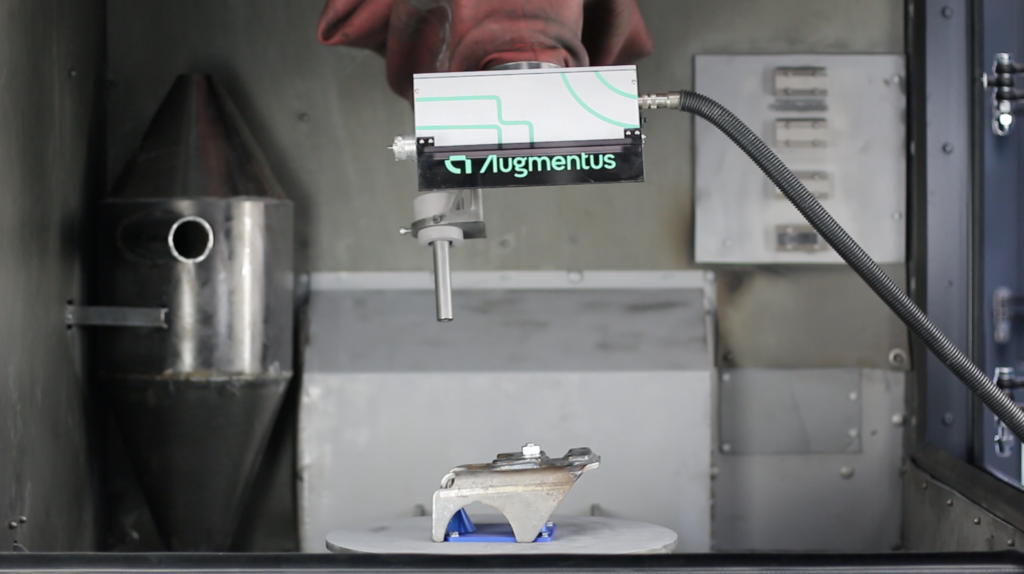 An Augmentus laser scanner is being used to capture a 3D scan, which will be used to program a robotic shot peening process